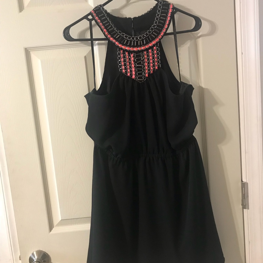 Brand new BEBE black mini dress size Large